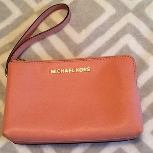 Michael Kors double sided wristlet.